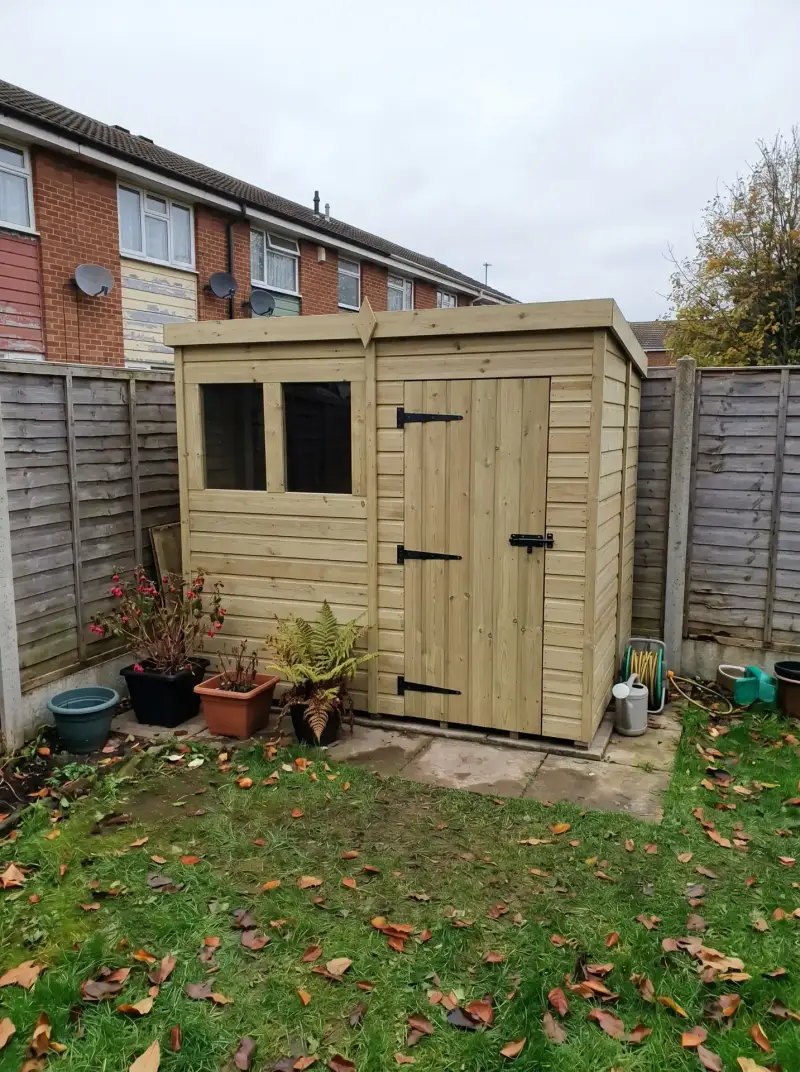 Timber garden building in a customer's garden